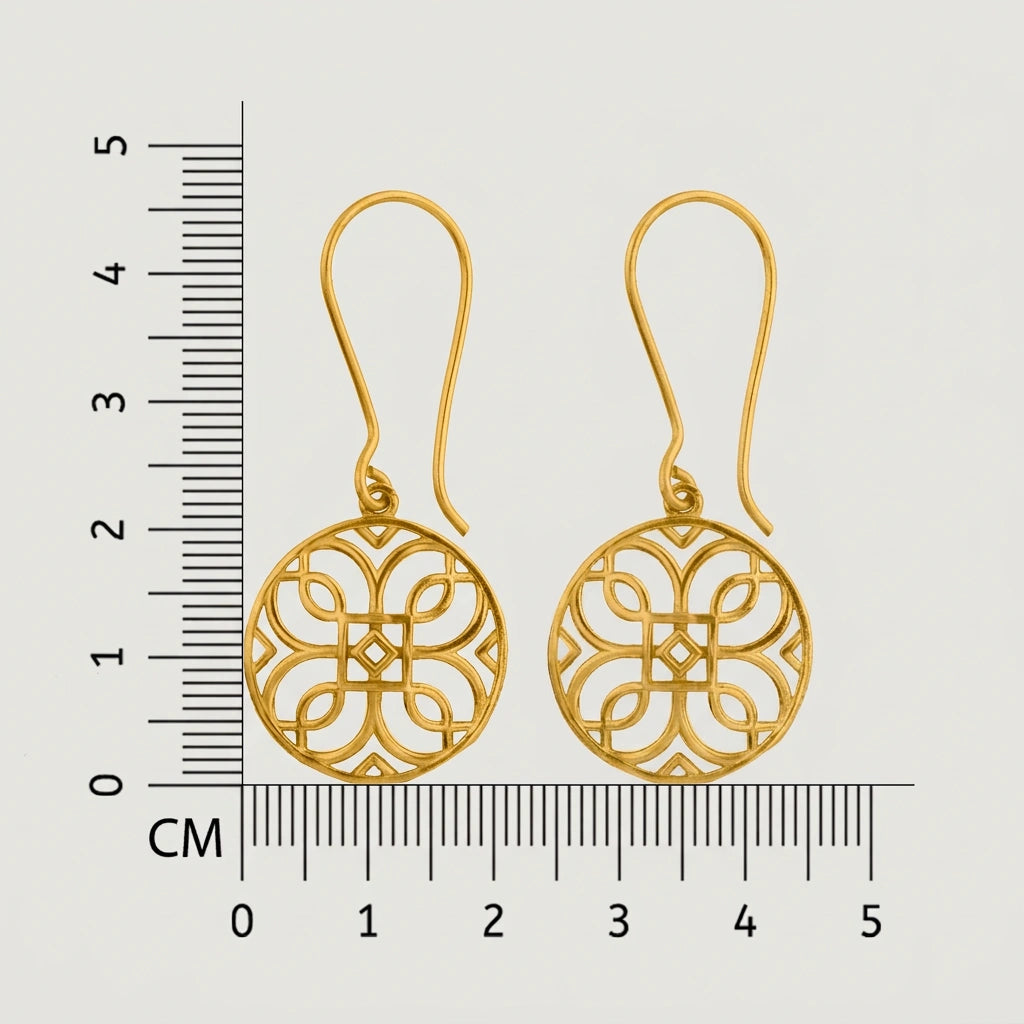 18k gold plated earrings with intricate designs on a white background with a ruler for scale.