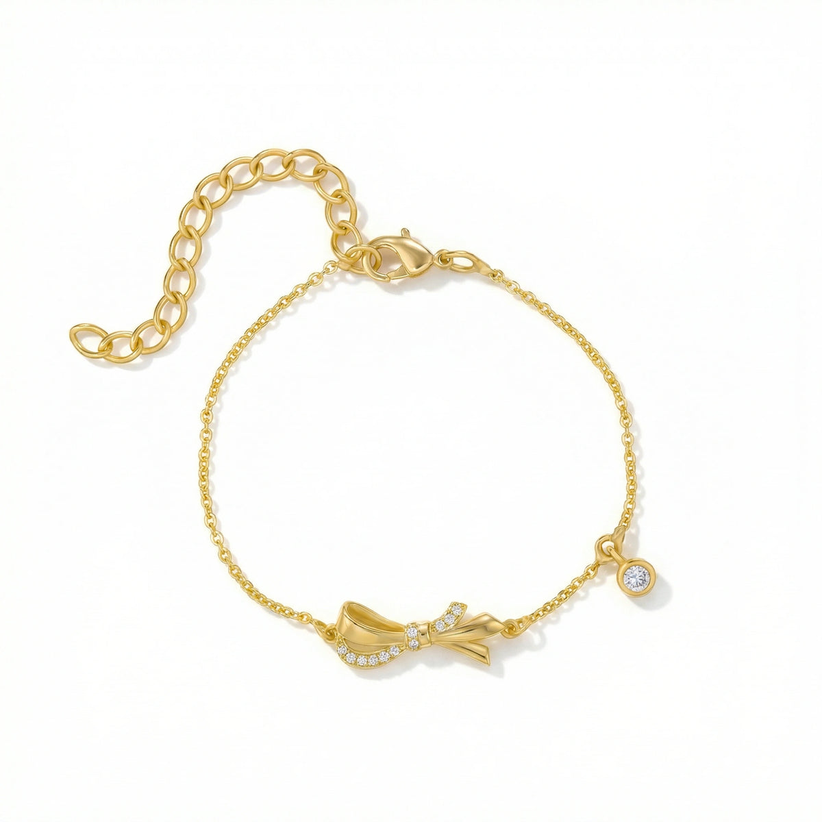 18k gold plated  bracelet with a bow design on a white background
