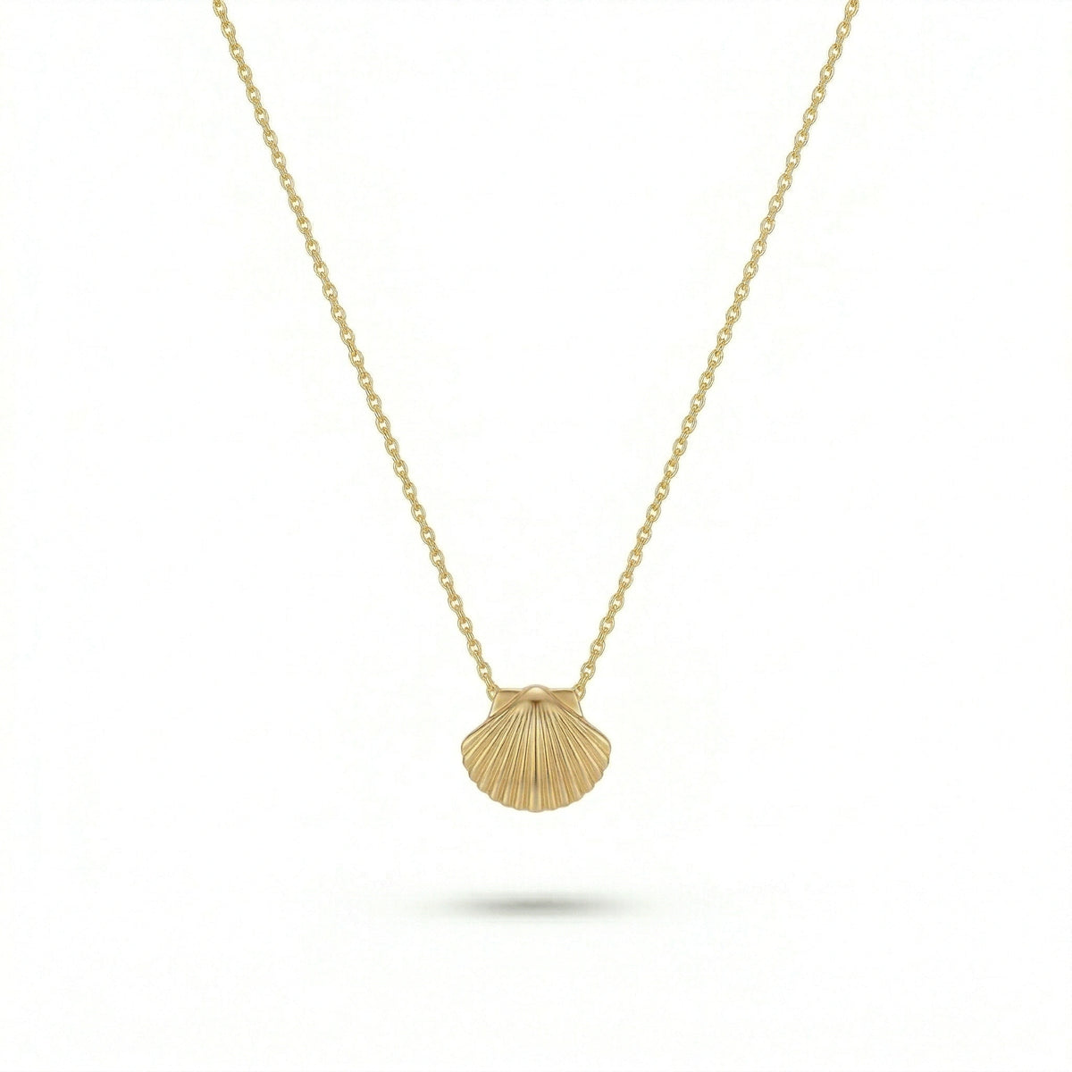 18k gold plated necklace with a shell pendant on a white background