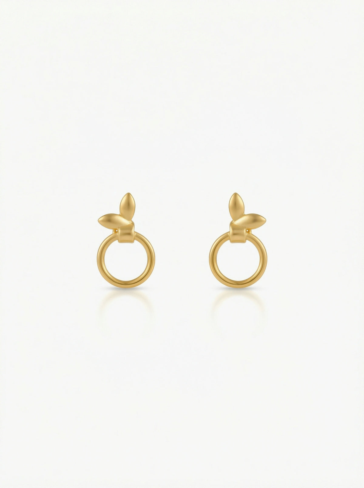 pair of 18k gold plated earrings on a white background