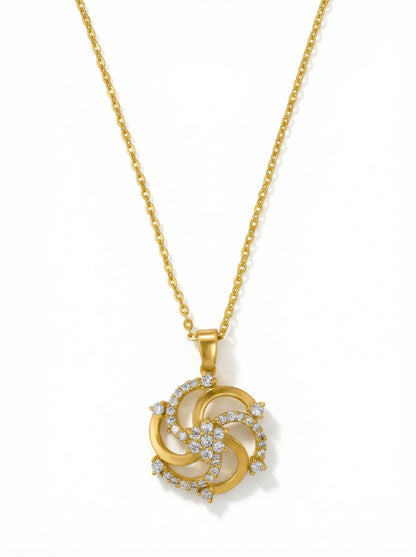 18k Gold plated necklace with a decorative pendant on a white background