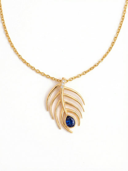 18k Gold plated necklace with a leaf-shaped pendant featuring a blue gemstone on a white background