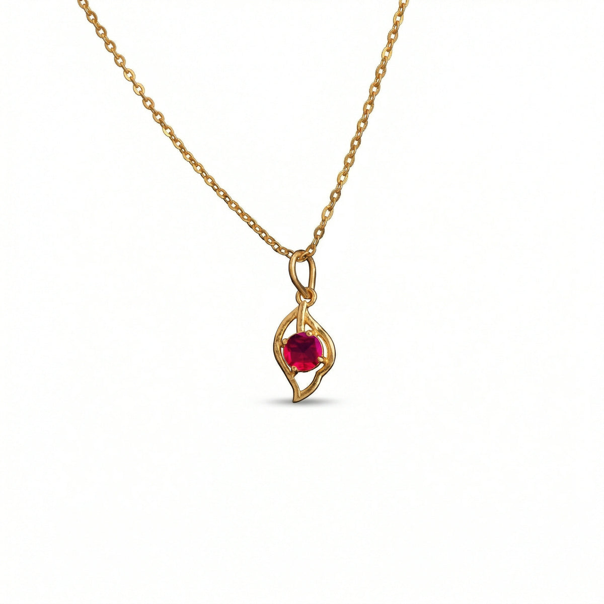 18k Gold plated  necklace with a red gemstone pendant on a white background