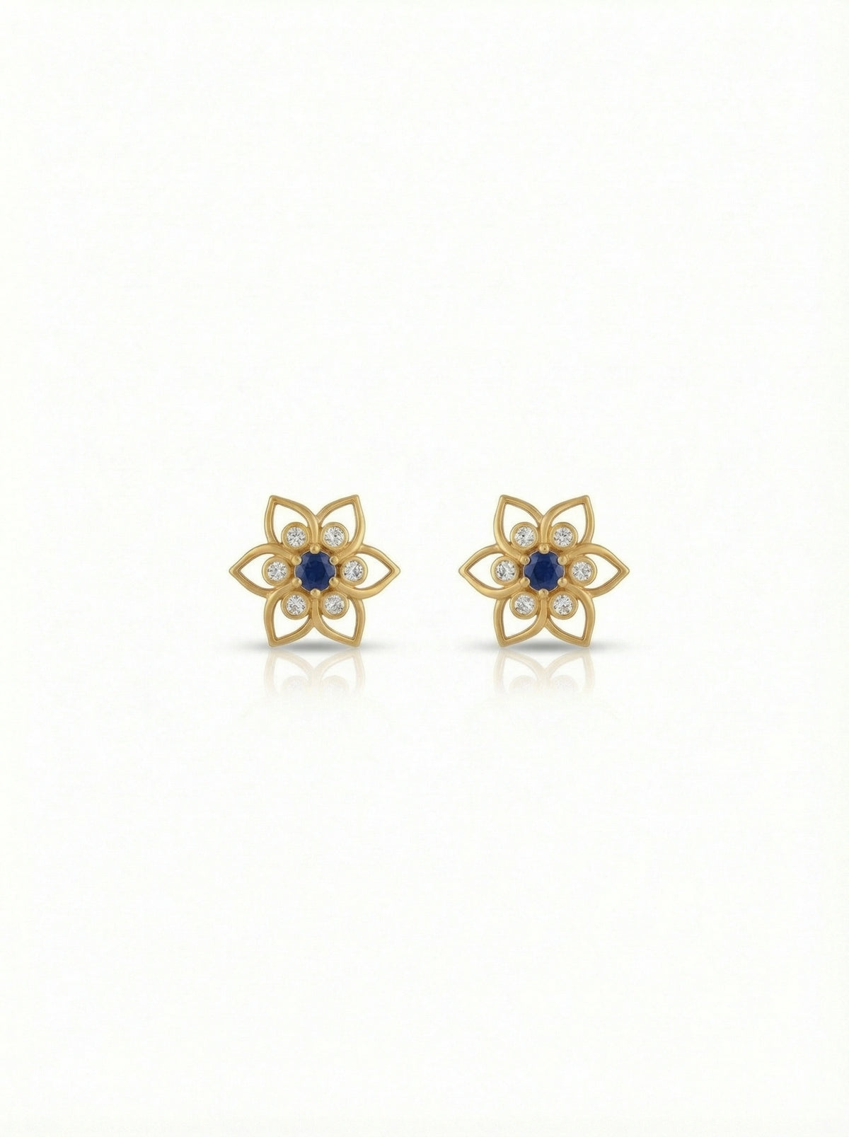 18k gold plated  flower-shaped earrings with blue centers on a white background