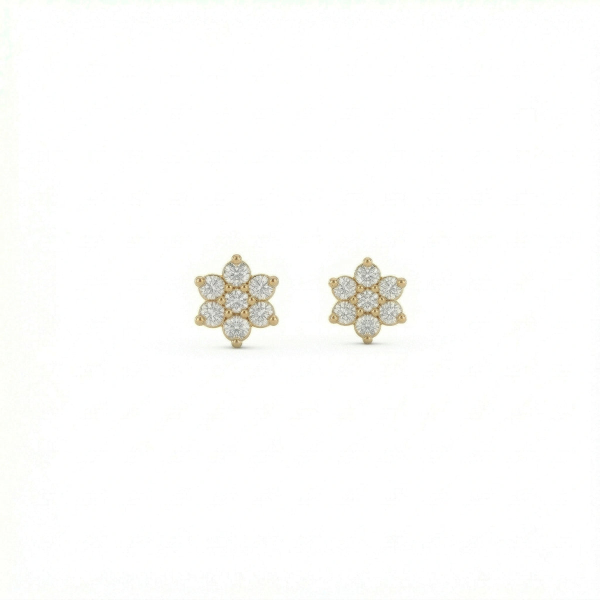 18K Gold Plated  flower-shaped earrings with clear stones on a white background