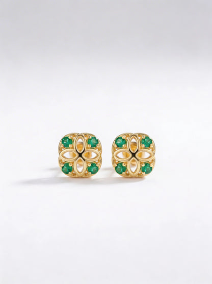 18k Gold plated earrings with green gemstones on a white background
