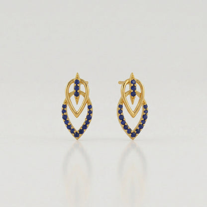 18k Gold plated  earrings with blue stones on a light gray background