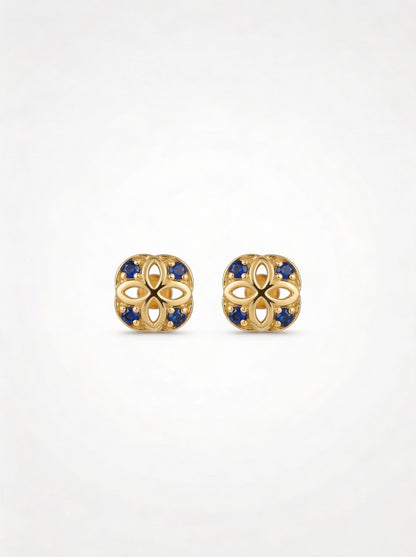 18k Gold plated earrings with blue stones on a white background