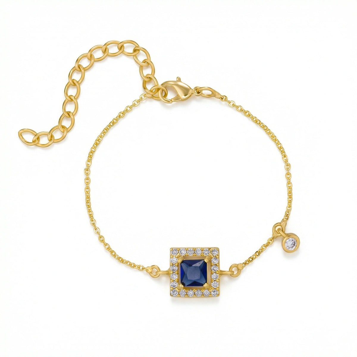 18k gold plated bracelet with a blue gemstone on a white background