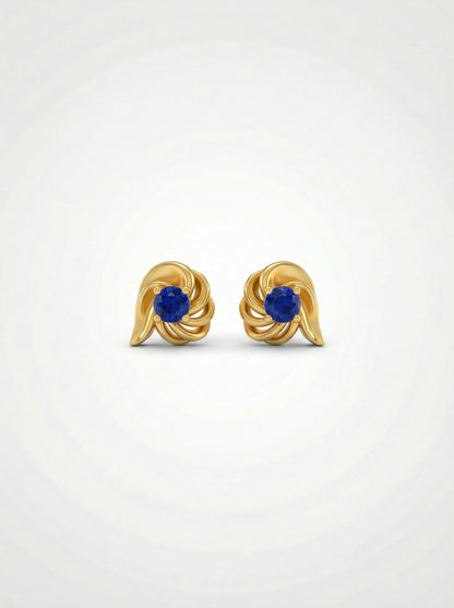 18k Gold plated  earrings with blue gemstones on a white background