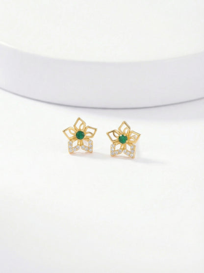 Pair of 18k gold plated earrings with green gemstones on a white background 