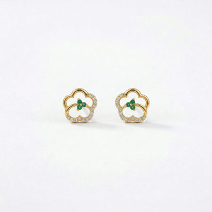 18k Gold plated earrings with green gemstones on a white background