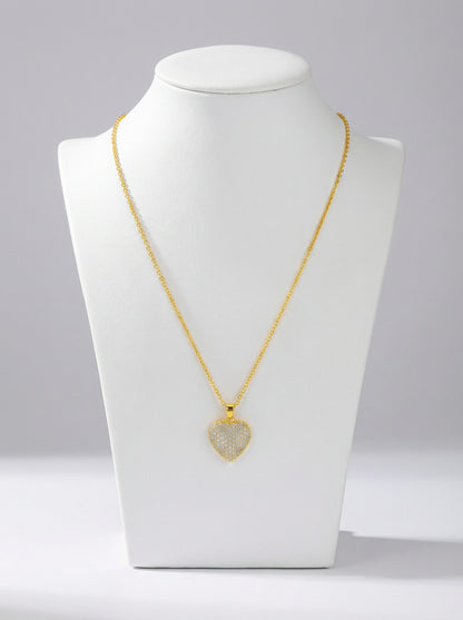 18k Gold plated necklace with a heart-shaped pendant on a white mannequin bust against a gray background