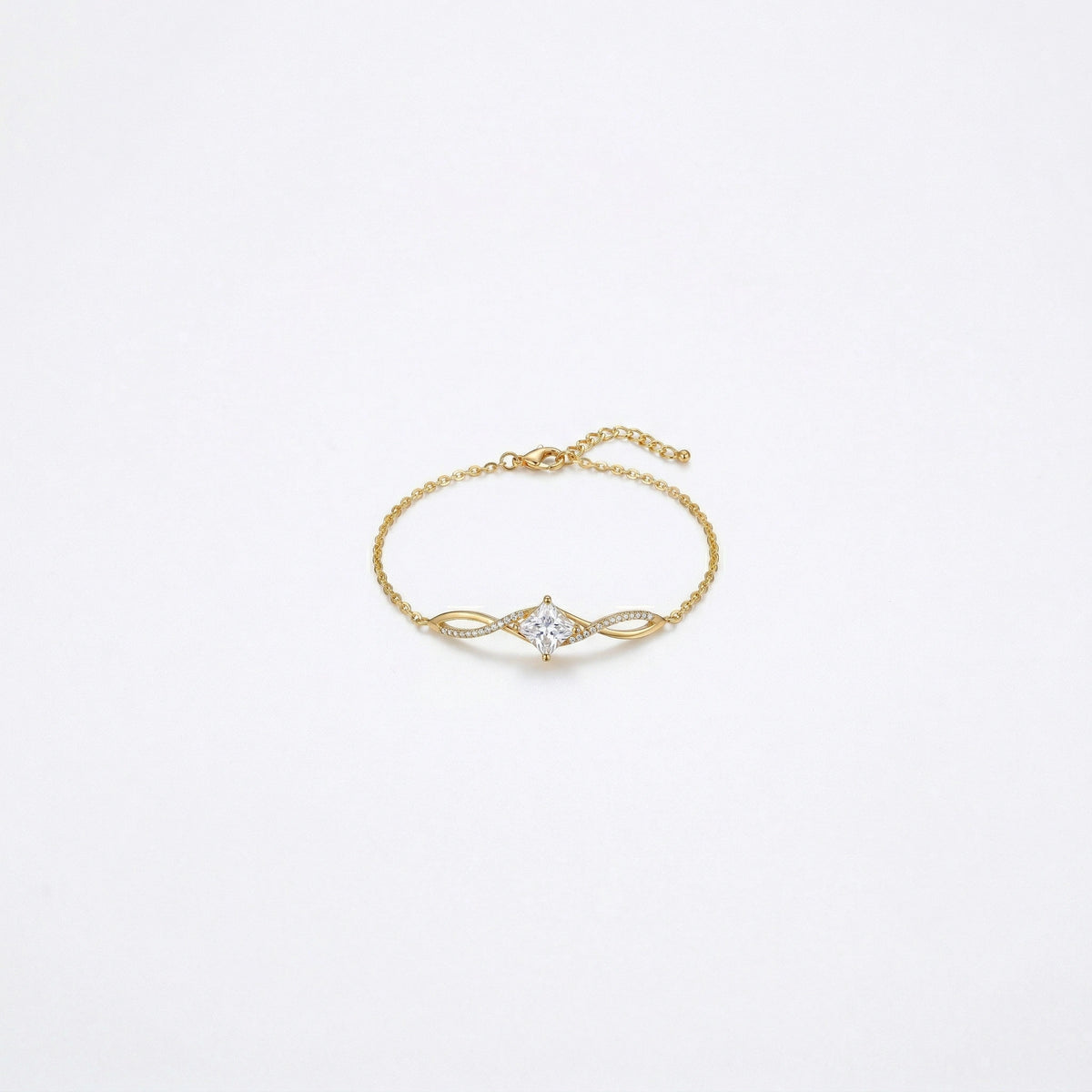 18k gold plated bracelet with a diamond on a light gray background