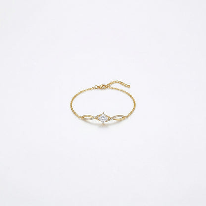 18k Gold plated bracelet with a diamond on a light gray background
