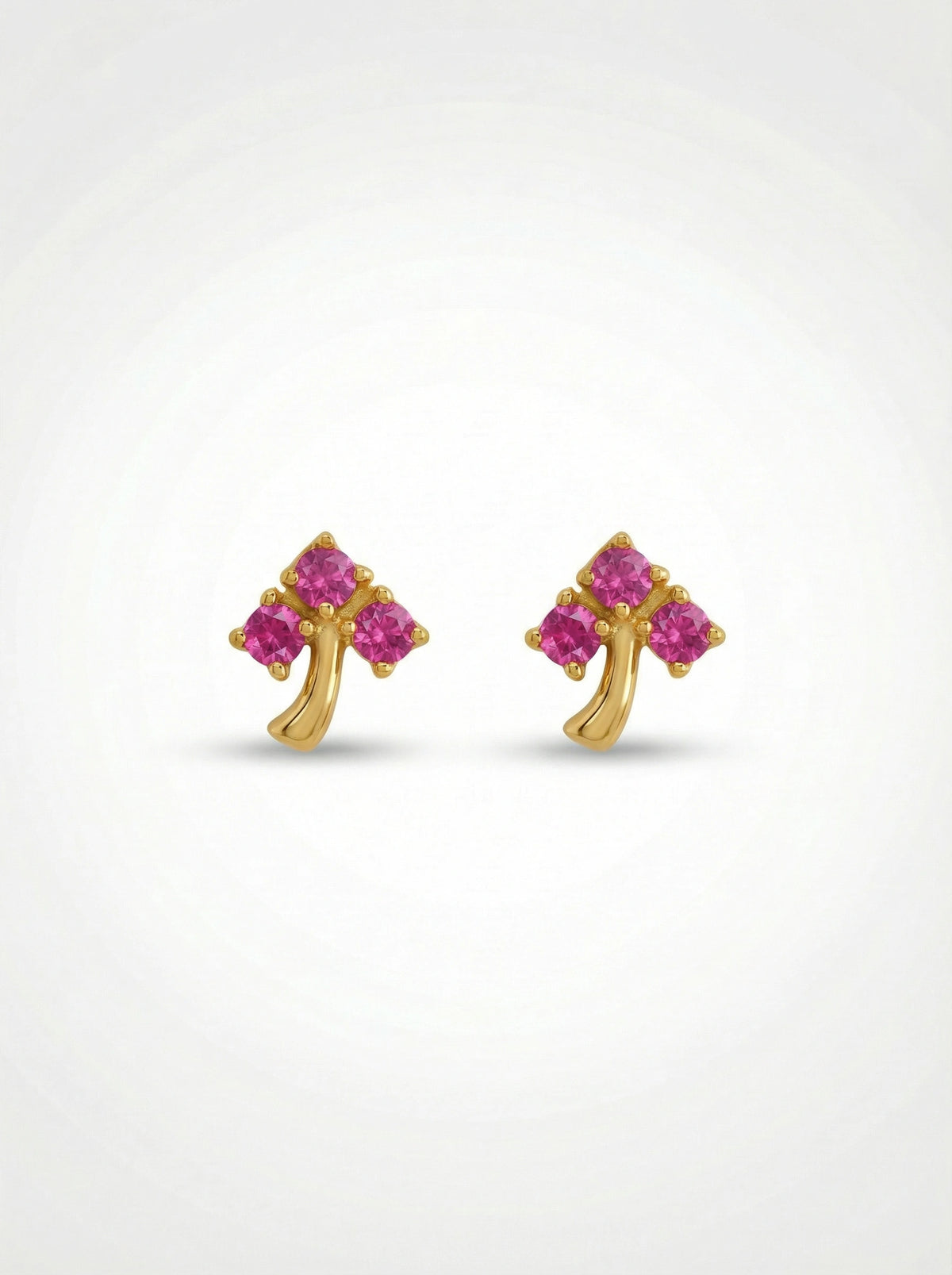 18k Gold plated  earrings with pink gemstones on a white background