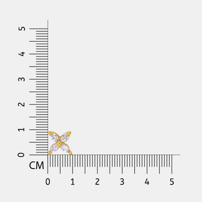 18k Gold plated and silver earring next to a ruler on a white background