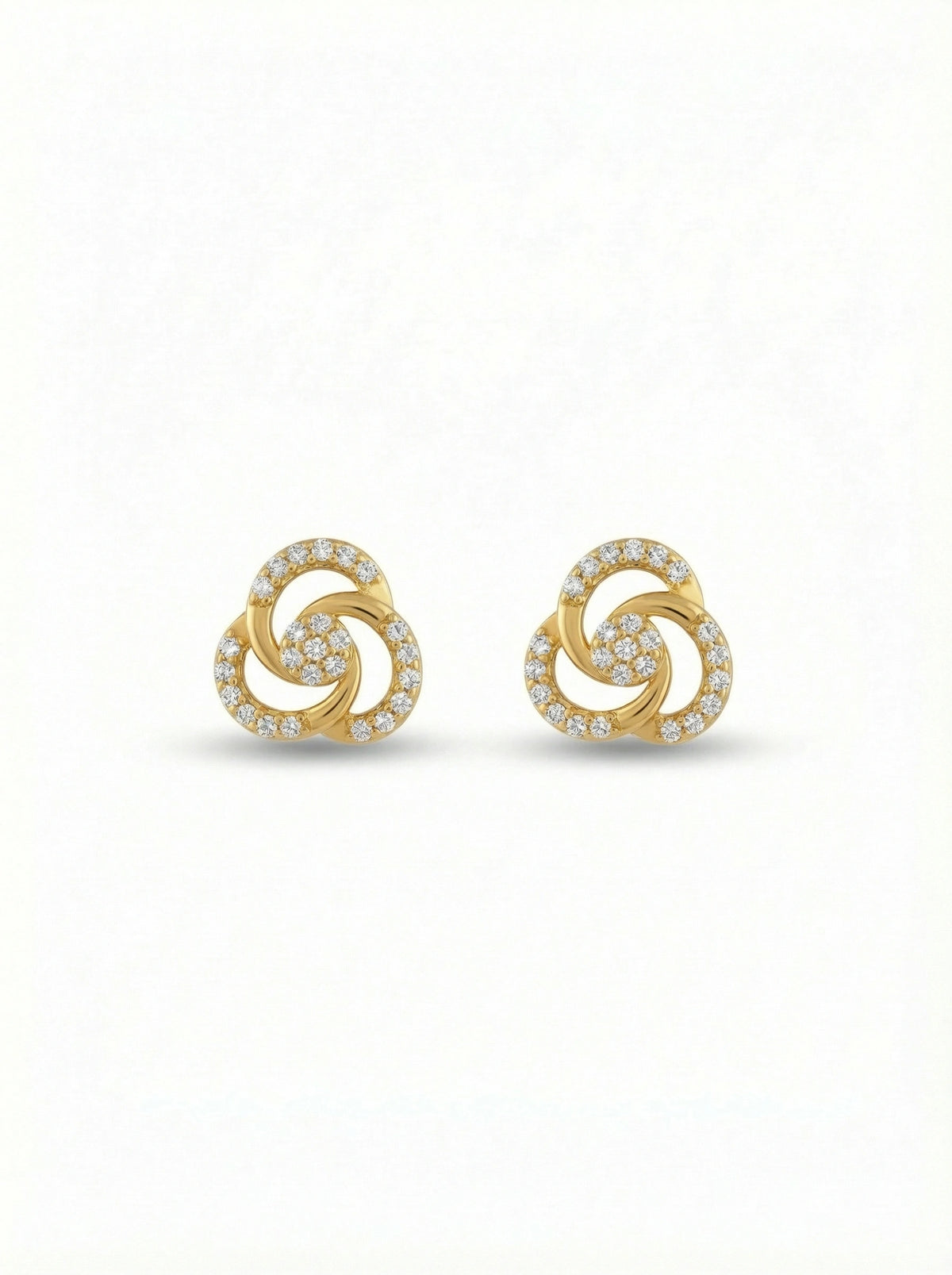 pair of 18k gold plated earrings with a spiral design on a white background