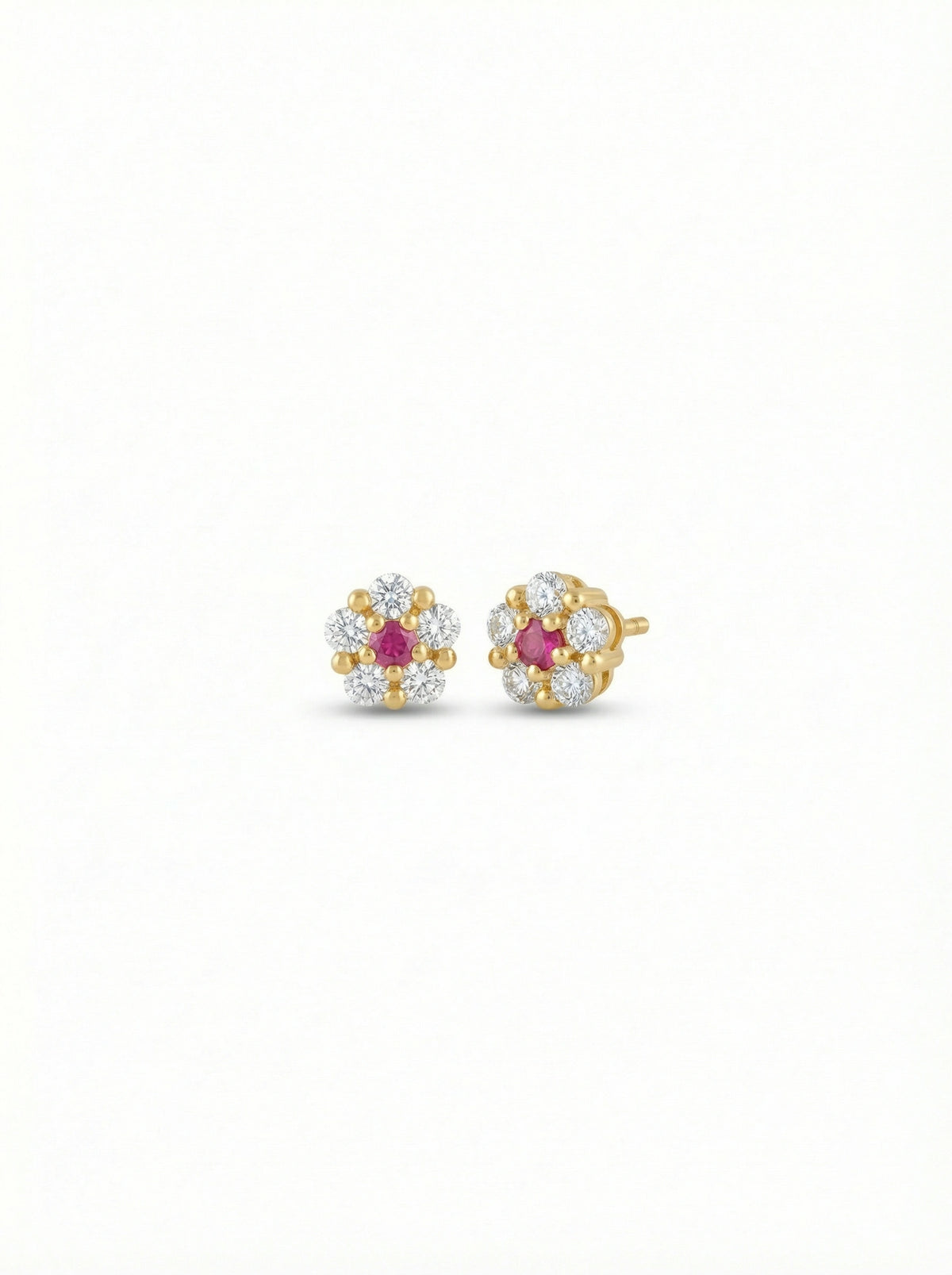 pair of 18k gold plated earrings with ruby stones on a white background