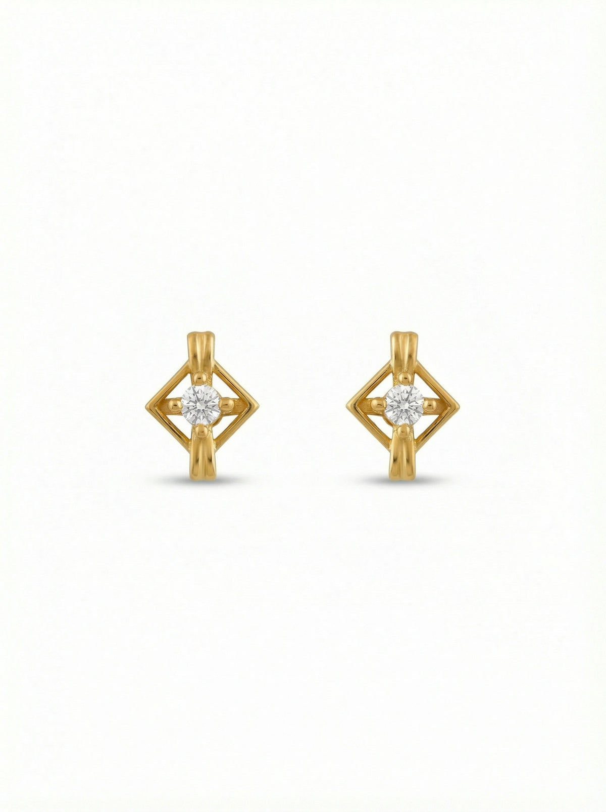 18k gold plated earrings with diamond-like stones on a white background