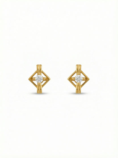 18k Gold plated earrings with diamond-like stones on a white background